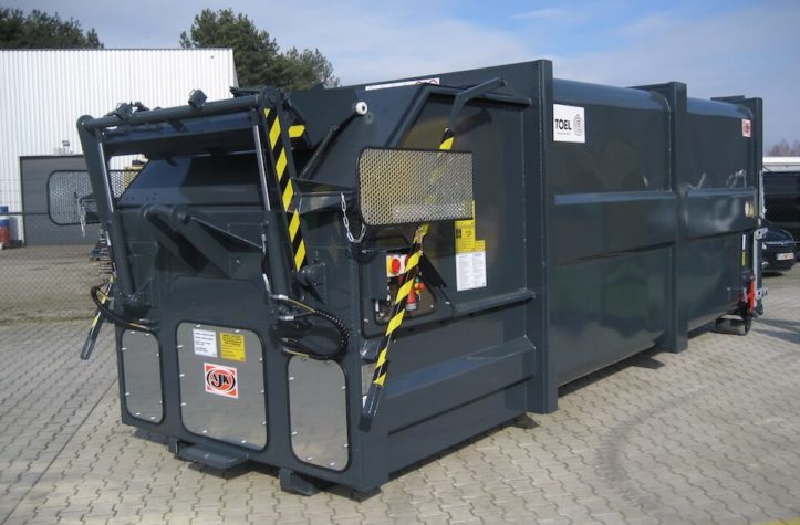 Conteneur de pressage avec dispositif de basculement